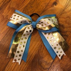 Blue, white, and gold hair bow